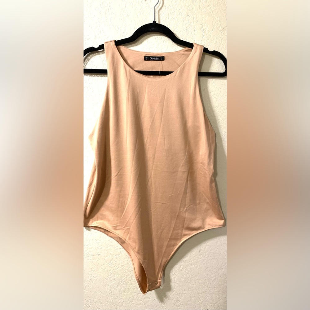 Dunnes Tan Bodysuit with Crew Neck and Minimalist Design